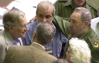 Cuban President Fidel Castro, right, talks with an American intellectual and linguist Noam Chomsky, left, before the start of the Latin American Council of Social Sciences conference in Havana, Cuba, Tuesday October 28, 2003. At center, between  Castro and Chomsky Cuban writer Carlos Marti looks on. (AP Photo/Cristobal Herrera)
